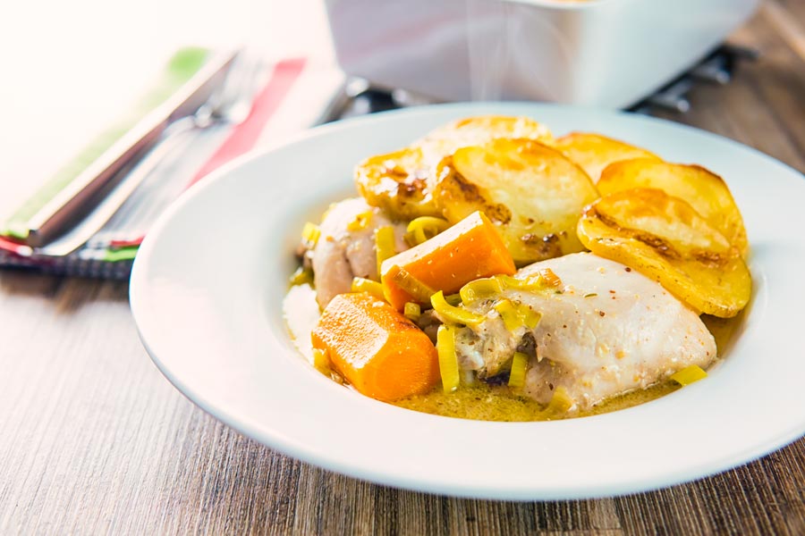 A hotpot is a little like a pie with a scalloped potato topping, this chicken hotpot features a mustard sauce and lots of leeks and carrots.