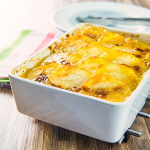 A hotpot is a little like a pie with a scalloped potato topping, this chicken hotpot features a mustard sauce and lots of leeks and carrots.