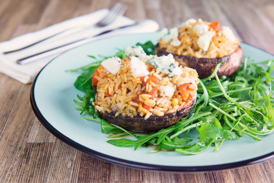These easy stuffed mushrooms are a great way to use up leftover rice and create a fantastic meal from store cupboard ingredients, these feature roasted red peppers, sun dried tomatoes and Roquefort cheese.