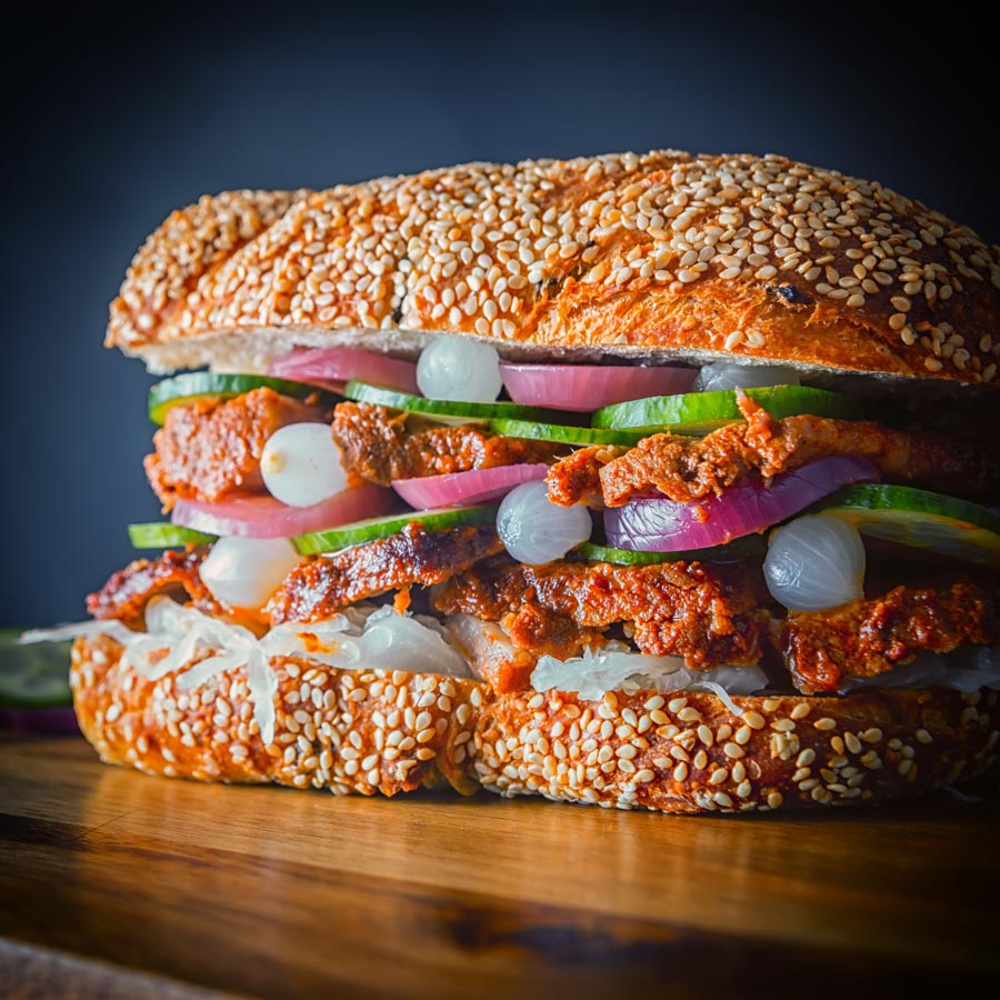 This BBQ Pork Sandwich is cooked in the Instant Pot and then blasted in the oven, the served on a ciabatta style loaf with lots of pickles.