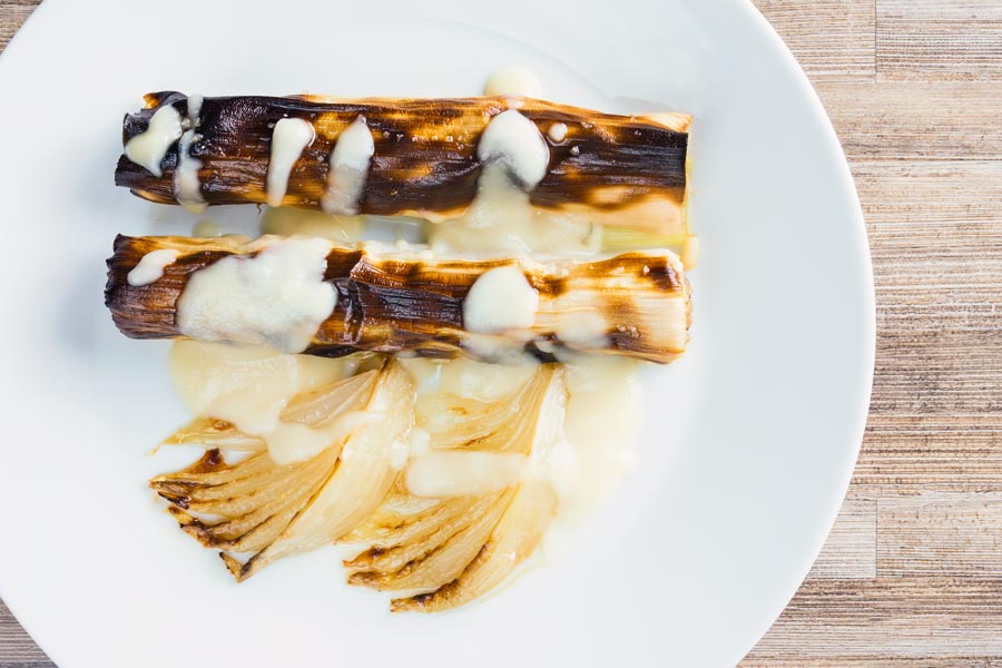 These leeks are wrapped around a mixture of pork, pine nuts, fennel and thyme and matched up with a fantastic pear and cider sauce!