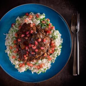 Fesenjan is a simple slow cooked Iranian stew featuring walnuts, pomegranate molasses, onions and chicken thighs that packs a huge punch of flavour.