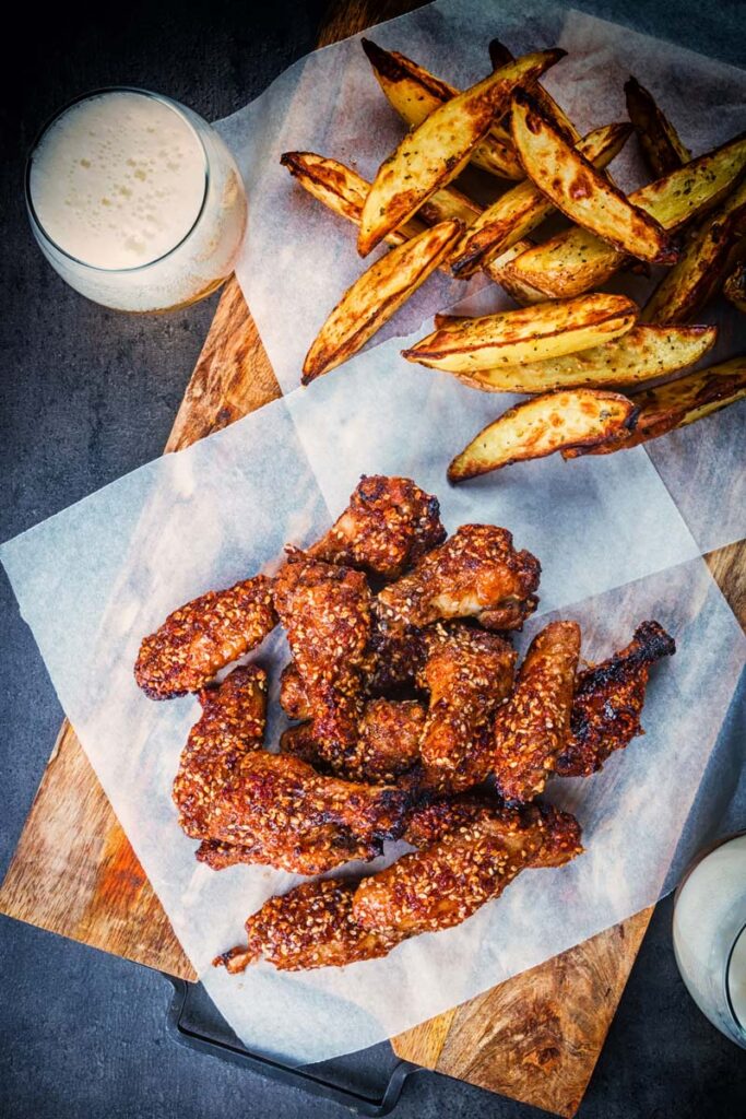 Enjoy a spicy buffalo chicken wing? Then look no further than this easy weeknight dinner, and these are pimped up with dates and a scotch bonnet chili in the glaze.