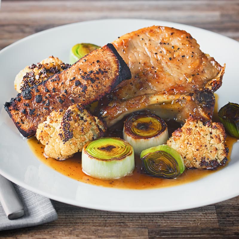 Any pork chops are great and these maple syrup and mustard glazed pork chops are joined by Cauliflower and Leeks to create a complete meal!
