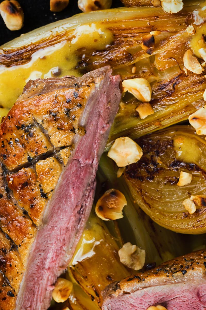 Endive may not be the first on the list of many peoples favourite vegetables, but it should be and it is perfect alongside this pan fried duck breast that utilises the cold pan method and is bundled a sexy anchovy sauce and it take less than an hour from start to finish. #endivesbraises #duckbreastrecipes #duckmaincourse #hazelnutsrecipes