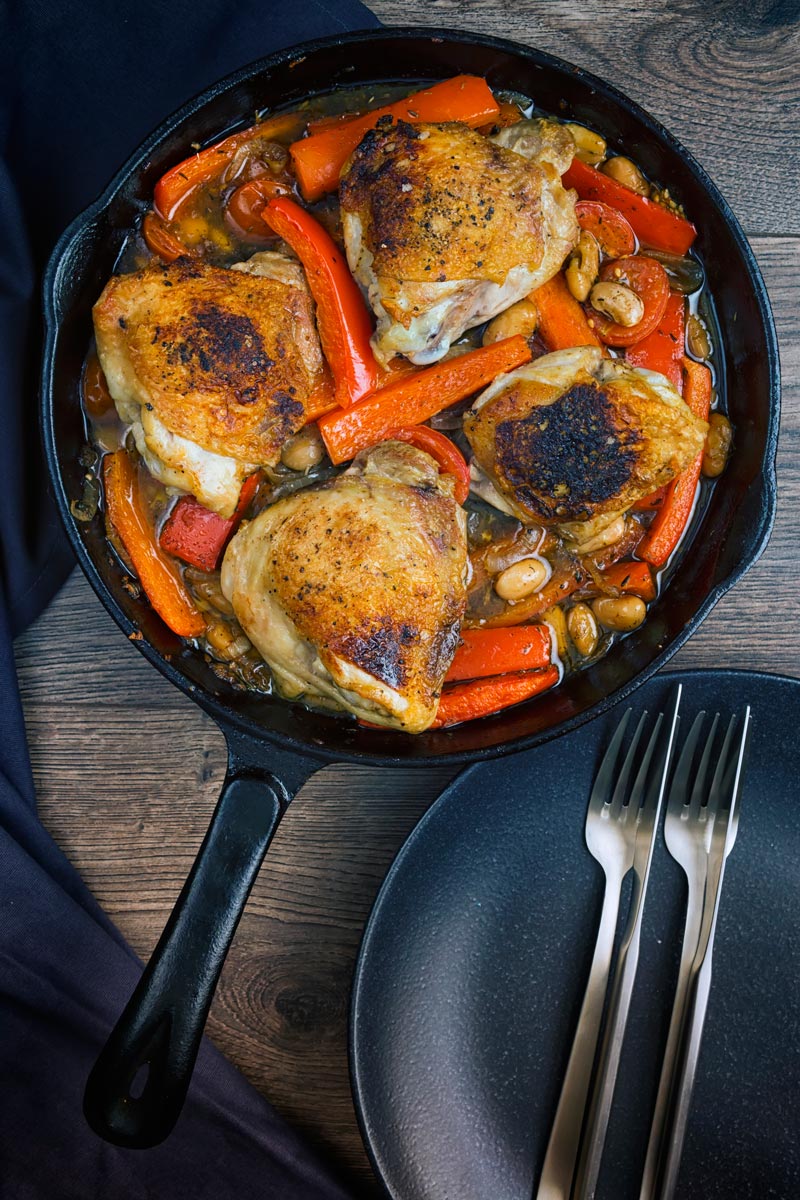 A chicken stew loaded with red peppers and beans and flavoured with Balsamic vinegar all cooked in one pot or skillet making it the perfect midweek dinner.
