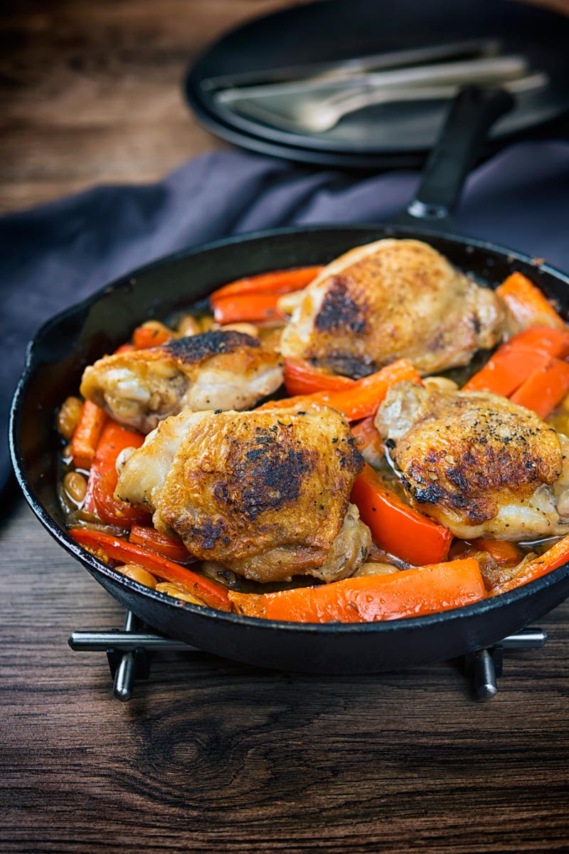 A chicken stew loaded with red peppers and beans and flavoured with Balsamic vinegar all cooked in one pot or skillet making it the perfect midweek dinner.