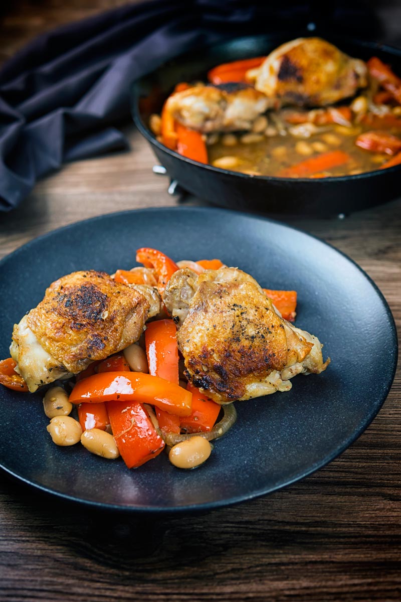 A chicken stew loaded with red peppers and beans and flavoured with Balsamic vinegar all cooked in one pot or skillet making it the perfect midweek dinner.