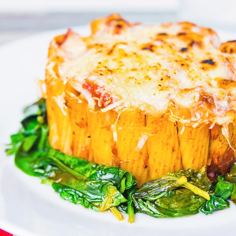 Yes, I know it is not really a pie, but hey it is my rigatoni pasta pie… Rigatoni standing to attention with a balsamic tomato sauce, mozzarella and Parmesan and wilted spinach!