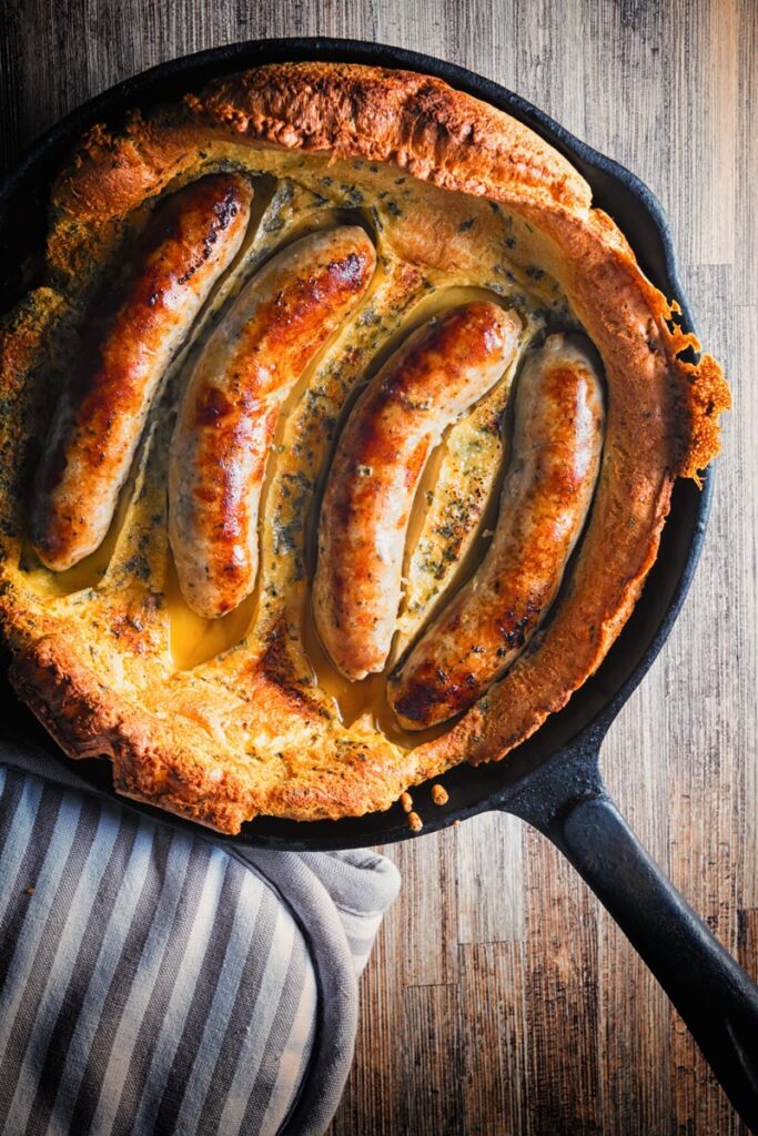 Toad in the Hole is about as British as can be and probably the defining food memory from my childhood! Sausages in a Yorkshire pudding batter and baked to perfection, forget Sunday Lunches this is quintessentially British!