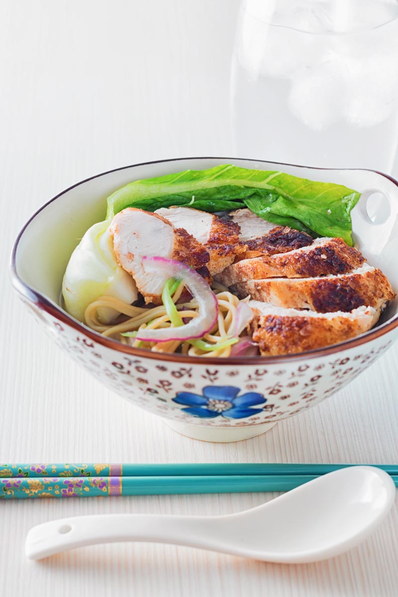 A simple Chinese chicken noodle soup has endless variations this one goes heavy on garlic and ginger and then compliments with simple light Asian flavours.