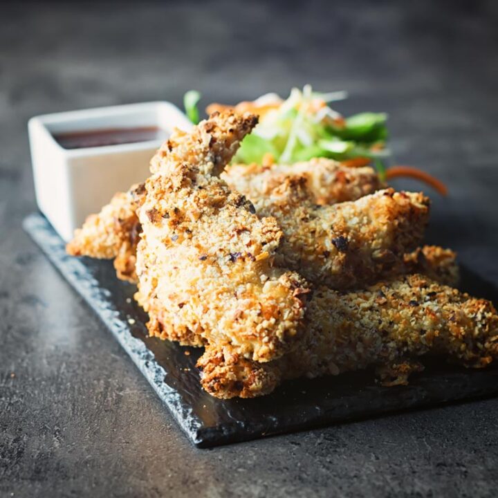 These Baked Hazelnut Crispy Chicken Tenders come bundled with a Spicy Dipping Sauce and can be munched on just 25 minutes after opening your cupboard! A family finger food favourite