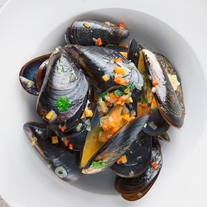 The ingredient list for these Beer Steamed Mussels make me go all 'Sound of Music', they are very much a list of my favourite things! I LOVE this recipe!