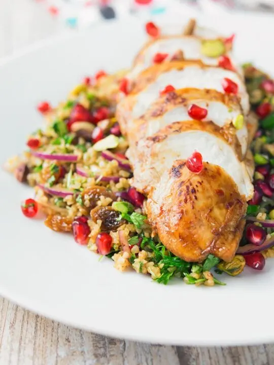 This pomegranate chicken breast is mariunaded for up to two days and them served on a vibrant bed of bulgur wheat stuffed full of glorious flavour!