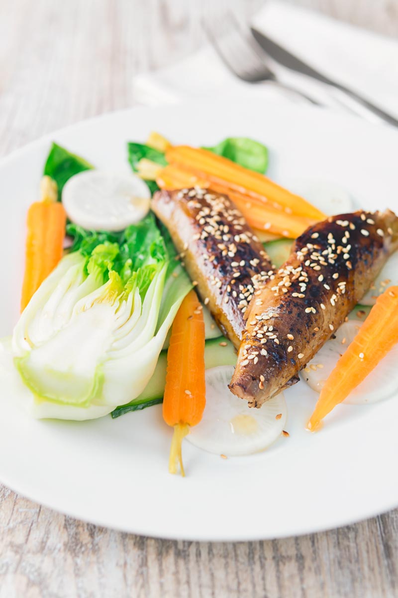 An Asian influenced smoked mackerel salad with bok choi, pickled carrots, cucumber and radish