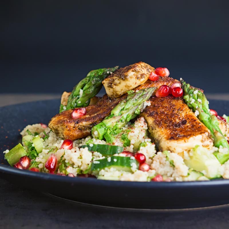 This Zaatar Halloumi Cheese With Cous Cous combines zaatar marinated and sautéd halloumi cheese with a fresh spring like jeweled couscous salad!