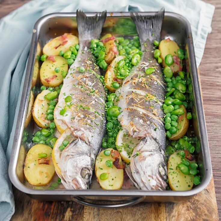 Whole Baked Sea Bass With Potatoes Broad Beans Krumpli