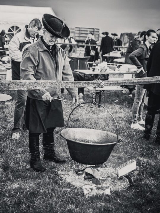 Traditional Hungarian cooking in a Cauldron or Kettle over and open fire at a food festival
