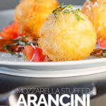 Portrait close up image of three golden stuffed arancini balls served on a white plate with tomato sauce, tomato concase and shredded basil with text overlay