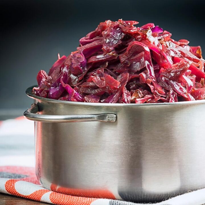 Square image of braised red cabbage served in a small aluminium pan