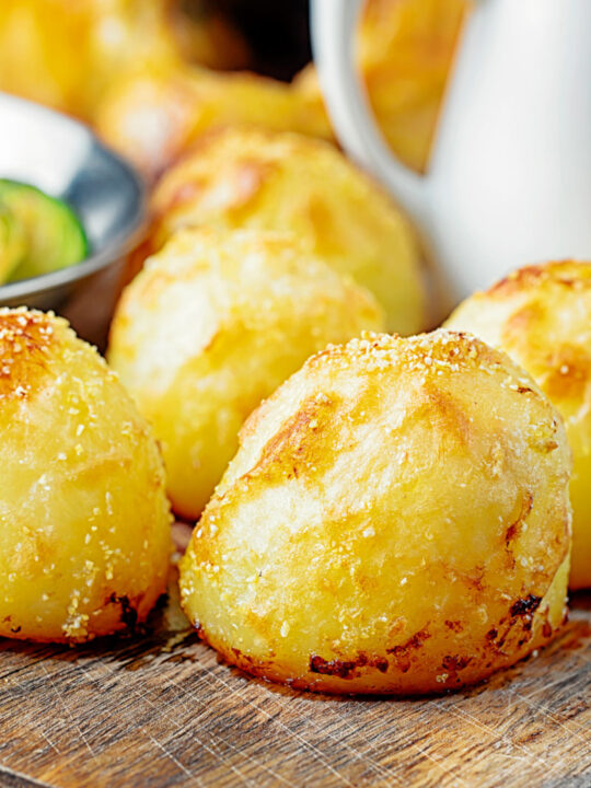 Portrait image of crispy roast potatoes