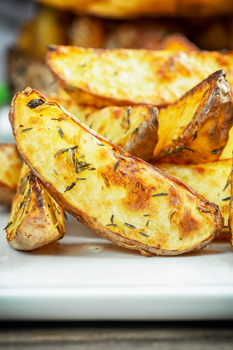 Close-up image of air fryer cooked potato wedges