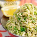 Portrait image of perfectly cooked bulgur wheat with fresh parsley and lemon wedges with text overlay