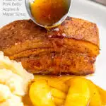 Portrait image of a sauce being poured from a spoon over crispy Pork Belly served with apples and celeriac mash with a text overlay