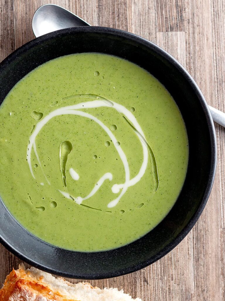 Portrait overhead image of a creamy broccoli and stilton soup