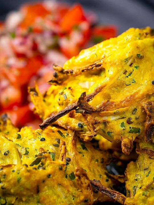 Portrait close up image of crispy air fryer onion bhaji or pakora