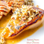 Portrait close up image of a savoury baked pears side dish in a cider sauce served on a white plate with text overlay