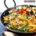 Portrait image of an Indian Chicken Dhansak lentil curry served in a cast iron karahi with a kachumber salad with a text overlay