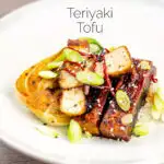 Portrait image of teriyaki tofu served with pak choi, white rice and spring onions on a white plate featuring a title overlay