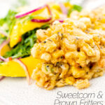 Portrait image of prawn fritters with sweetcorn and spring onion served with a mango salad featuring a title overlay
