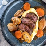 Portrait overhead image of beer braised beef cheeks with carrot, shallot and mushrooms served over mashed potato featuring a title overlay