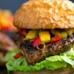 Jamaican jerk chicken burger with a mango salsa and crispy lettuce