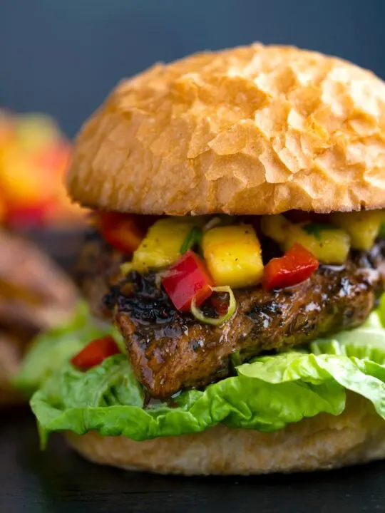 Jamaican jerk chicken burger with a mango salsa and crispy lettuce