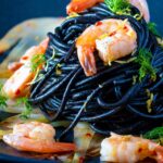 Prawn pasta with squid ink spaghetti fennel, lemon zest and chilli.