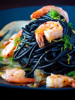 Prawn pasta with squid ink spaghetti fennel, lemon zest and chilli.