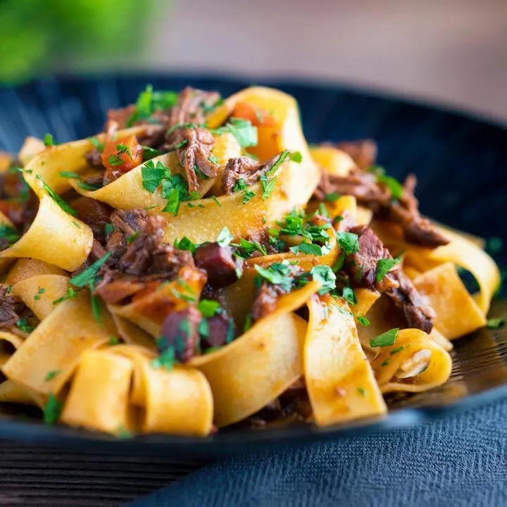 Shredded venison ragu sauce served with pappardelle pasta.