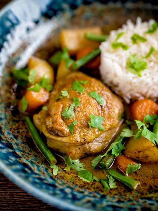 Vietnamese chicken curry or ca ri ga with rice, potatoes, green beans & carrots.