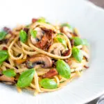 Bacon and mushroom pasta with sun dried tomatoes.