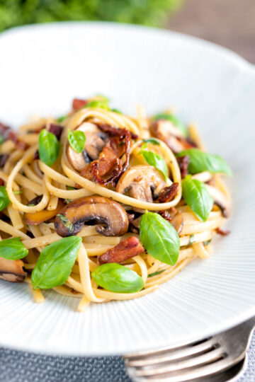 Bacon and mushroom pasta with sun dried tomatoes.