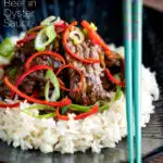 Beef in oyster sauce Chinese takeaway stir fry served with rice featuring a title overlay.