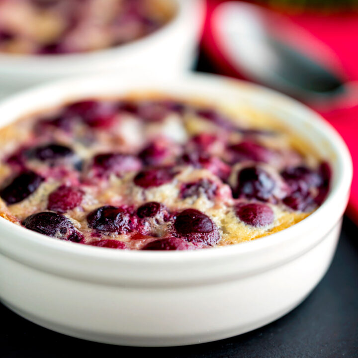 Individual fresh cherry clafoutis dessert.