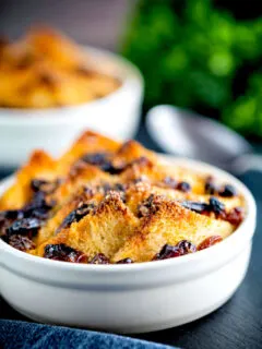 Individual bread and butter puddings served in creme brulee bowls.