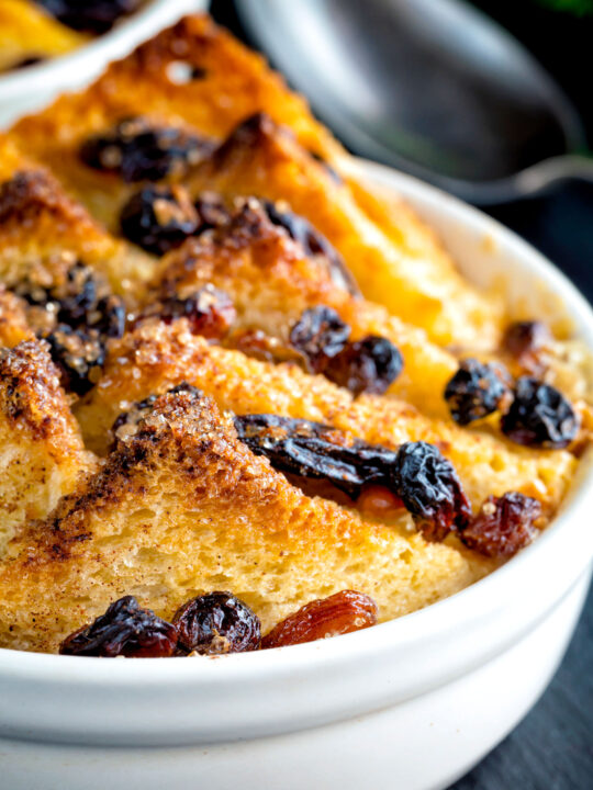 Close up individual bread and butter pudding.