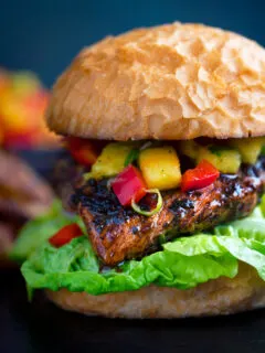 Jamaican jerk chicken burger with a mango salsa and crispy lettuce.