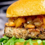 Pork and apple burgers served with rocket and apple chutney.