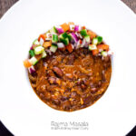 Overhead Rajma masala kidney bean curry served with kachumber salad featuring a title overlay.